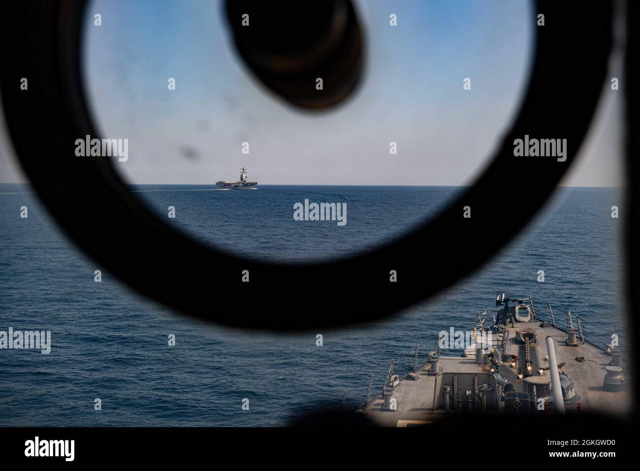 210418-N-CE622-0144  ATLANTIC OCEAN (April 18, 2021) – The guided-missile destroyer USS Winston S. Churchill (DDG 81) conducts horizon reference unit drills with the aircraft carrier USS Gerald R. Ford (CVN 78), April 18. Churchill is operating underway in the 2nd Fleet area of operations in support of naval operations with Ford. Stock Photo