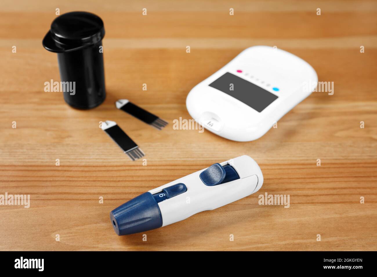 Composition with digital glucometer on wooden background. Diabetes
