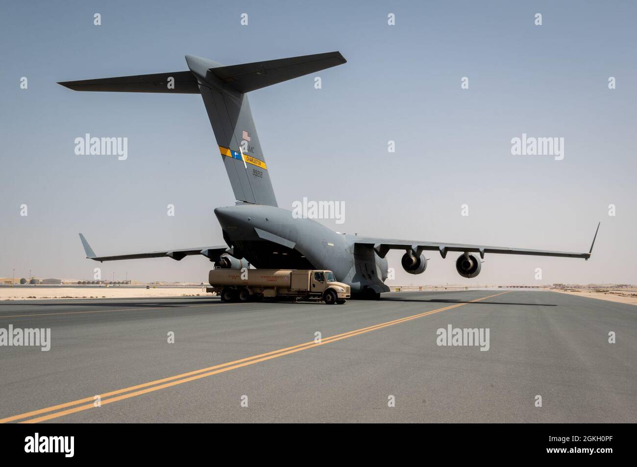 An R-11 fuel truck is parked to start a refueling event with a U.S. Air ...