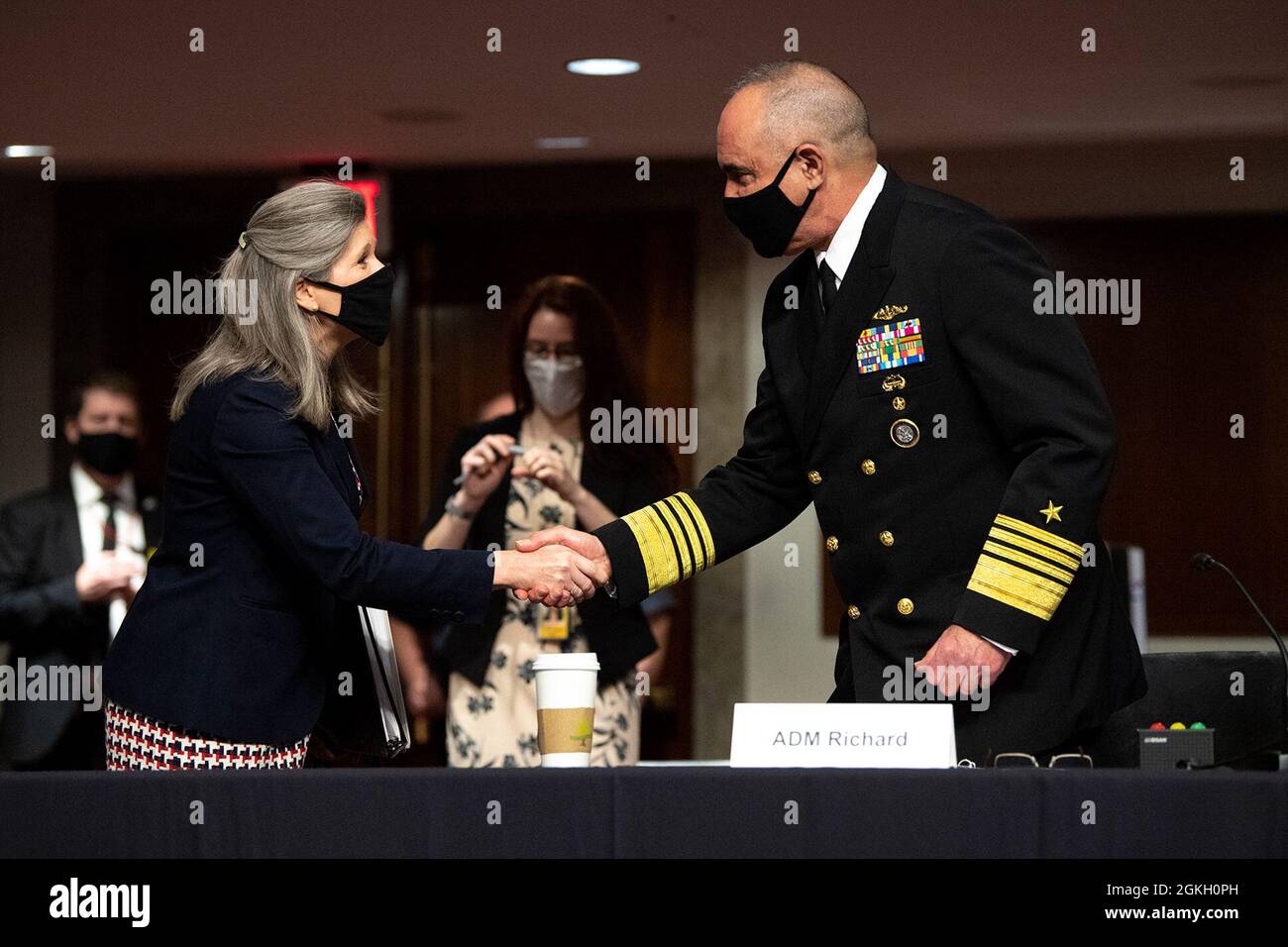 U.S. Joni Ernst (R-Iowa) greets Adm. Charles ‘Chas’ A. Richard, commander U.S. Strategic Command, before he testifies to the Senate Armed Services Committee in Washington, D.C. April 20, 2021. Stock Photo