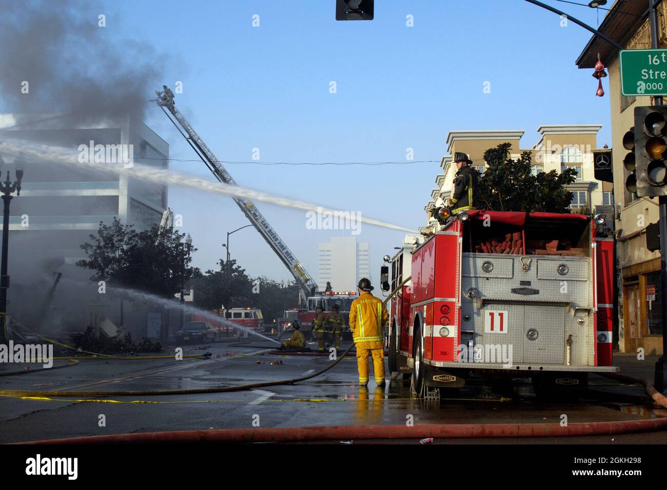 San Diego Fire Rescue Engine 11 using deck gun at Jerome's Fire in downtown San Diego. Stock Photo