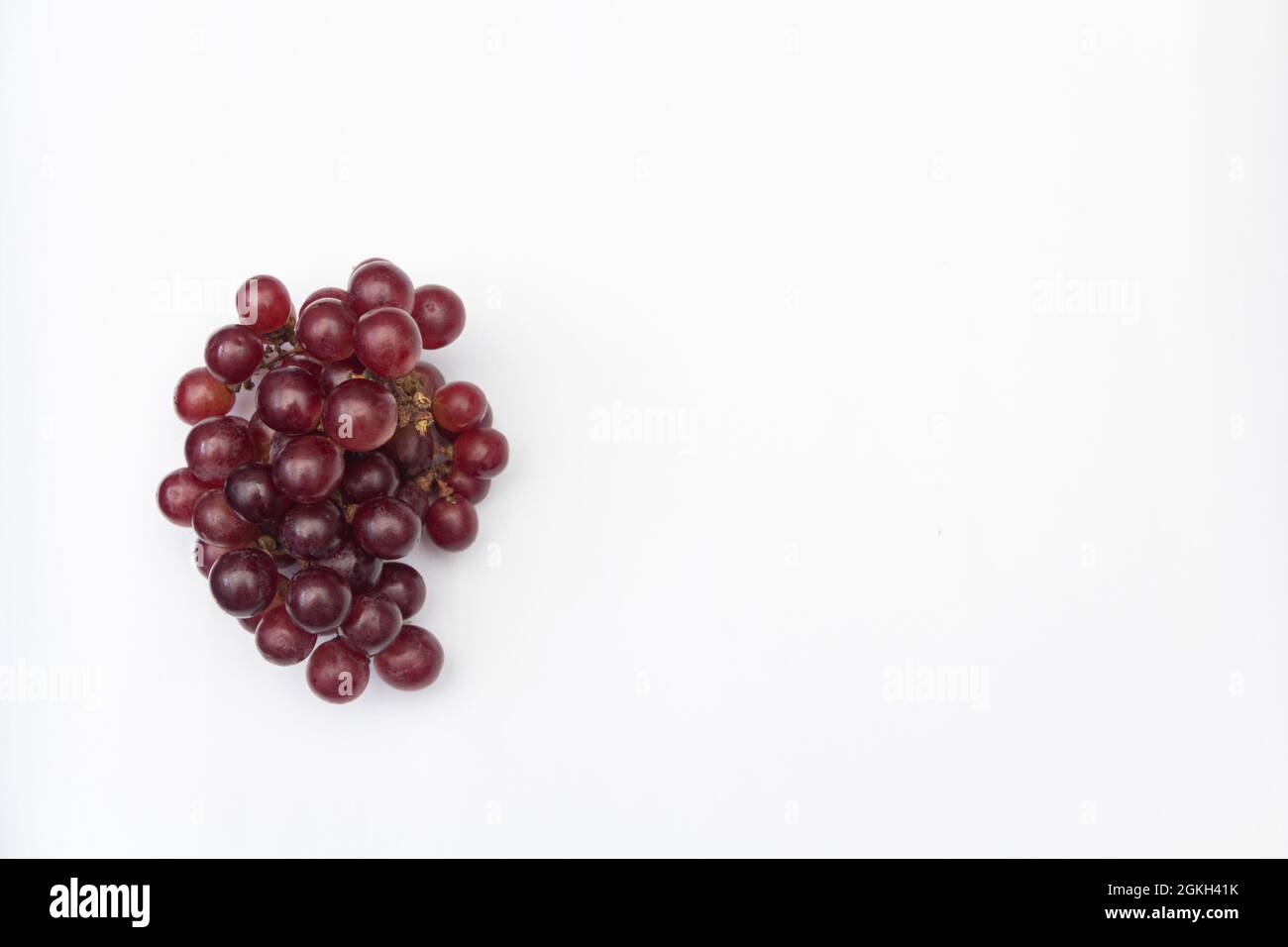 red grapes on white background Stock Photo