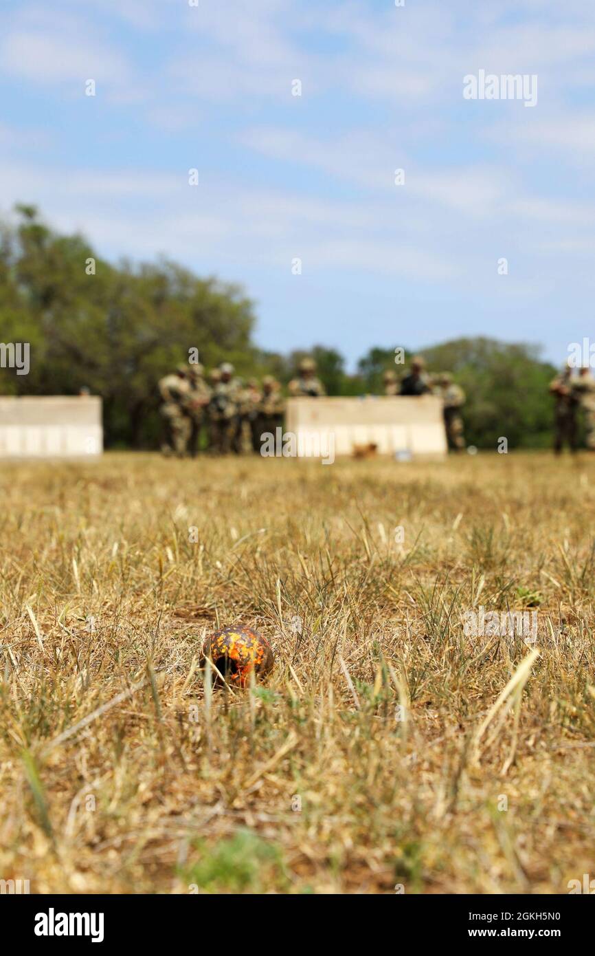 Soldiers from across the Military Intelligence Readiness Command (MIRC) competed in a grenade toss event during the MIRC Best Warrior Competition (BWC) at Joint Base San Antonio – Camp Bullis April 21, 2021. Events such as the grenade toss test the competitors’ capabilities and combat-readiness and help determine which Soldier will be named the MIRC’s Best Warrior. Stock Photo