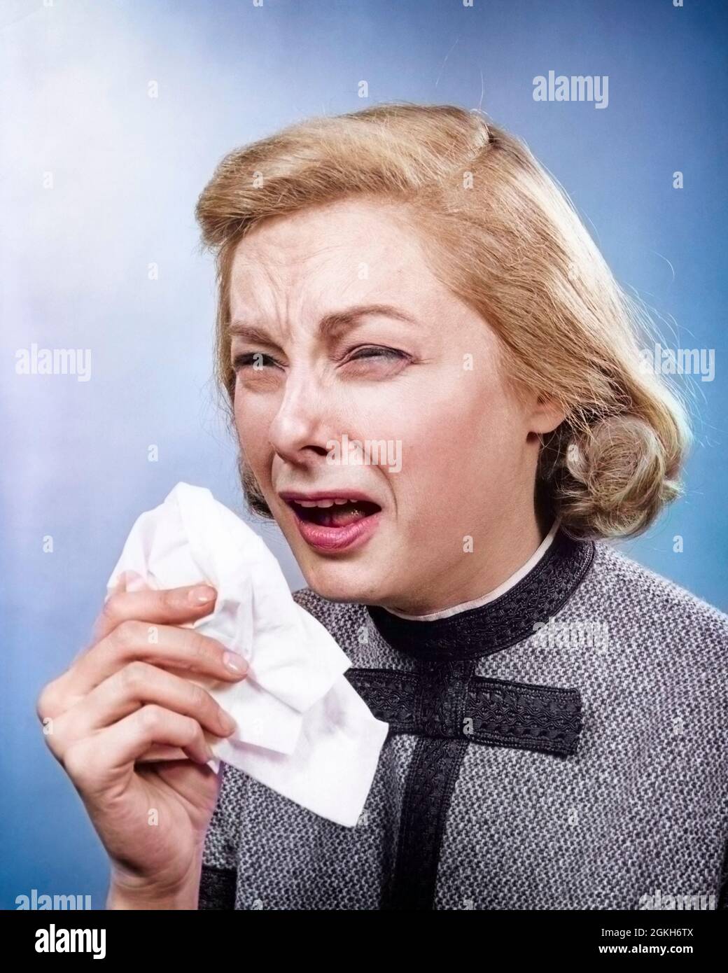 1950s WOMAN WITH HANDKERCHIEF SNEEZING INDOOR - a1594c HAR001 HARS AILMENT B&W SADNESS SICKNESS MINOR HEALTHCARE SUFFERING WELLNESS HEAD AND SHOULDERS HANDKERCHIEF ILLS HURTFUL HEALTH CARE SUFFER SUFFERER ILLNESSES HURT HURTING MEDICAL PROBLEMS INFECTIONS MINOR ILLNESS ACHING PAINED PROBLEMS MEDICAL PROBLEM POOR HEALTH AILING AILMENTS INFECTION MID-ADULT MID-ADULT MAN PAINS ACHE BLACK AND WHITE CAUCASIAN ETHNICITY HAR001 OLD FASHIONED Stock Photo