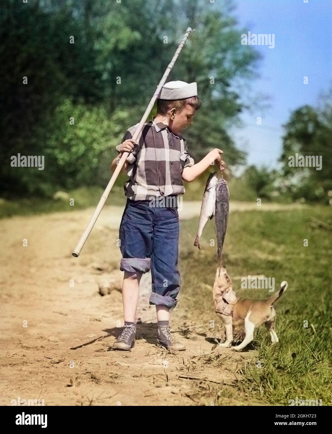 Boy fishing dog hi-res stock photography and images - Alamy