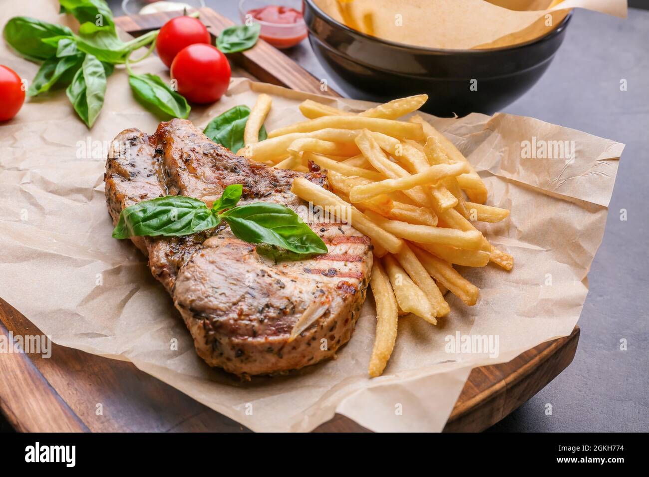 Delicious grilled steak frites on waxed paper Stock Photo Alamy
