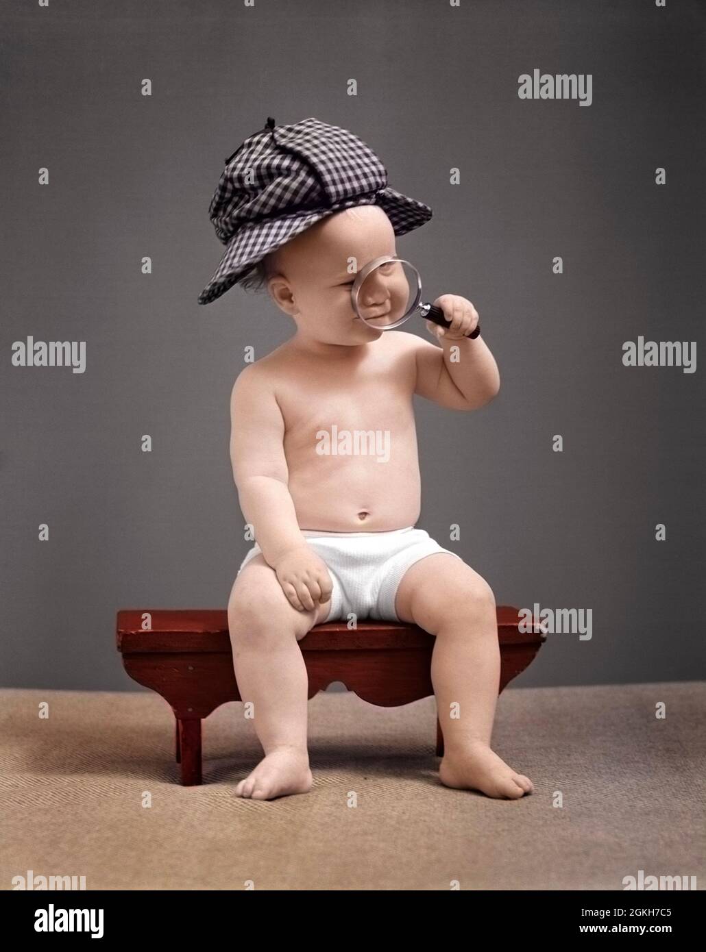 1940s BABY SHERLOCK HOLMES IN DIAPER SITTING ON BENCH WEARING DEER STALKER HAT LOOKING THROUGH MAGNIFYING GLASS - b17532c HAR001 HARS COPY SPACE FULL-LENGTH MALES DIAPER B&W ADVENTURE DISCOVERY KNOWLEDGE DIAPERS DETECTIVE OCCUPATIONS INVESTIGATOR SHERLOCK HOLMES STYLISH DEERSTALKER BABY BOY STALKER JUVENILES SOLUTIONS YOUNGSTER BLACK AND WHITE CAUCASIAN ETHNICITY DEER HAR001 OLD FASHIONED Stock Photo
