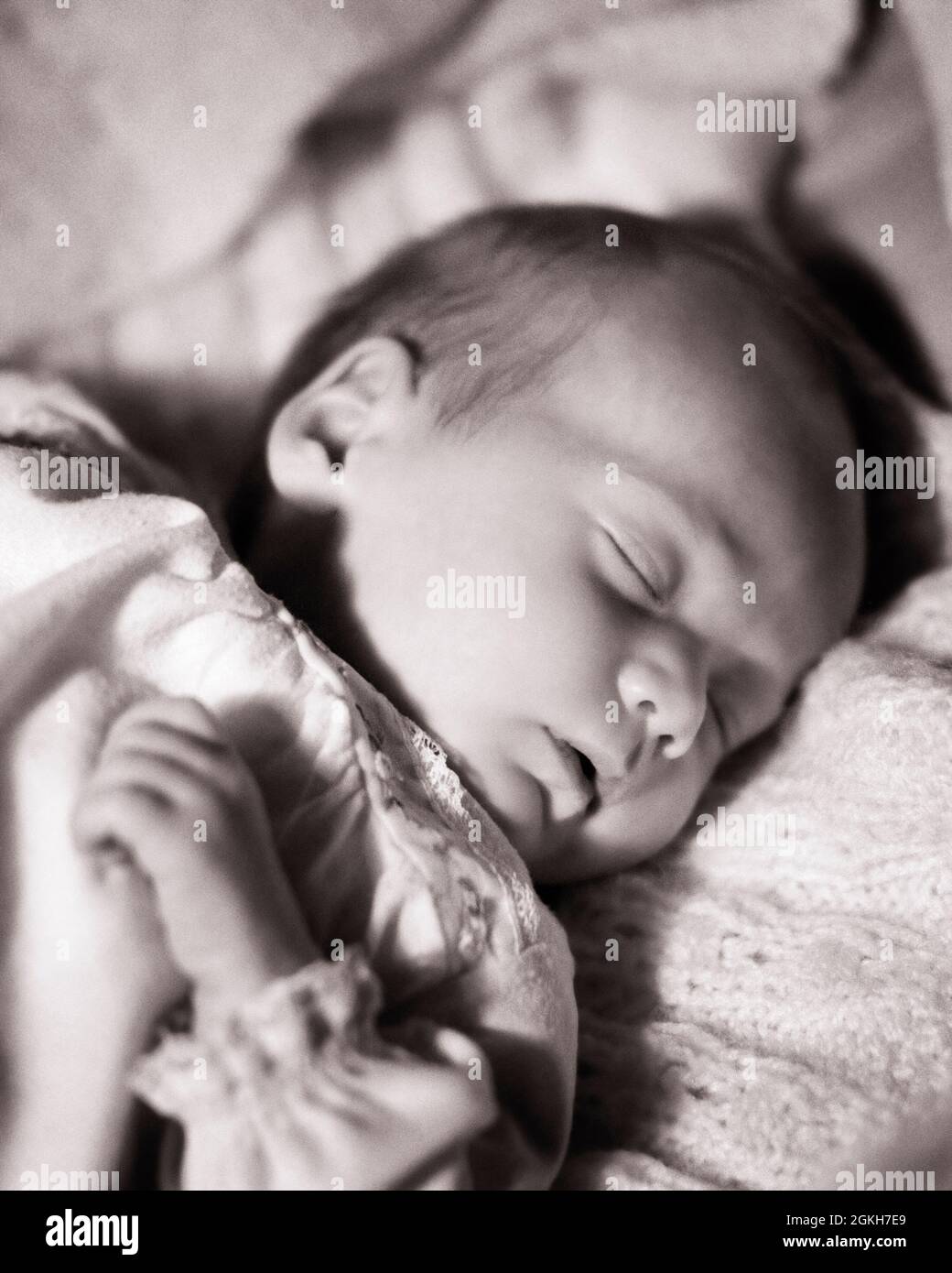 1970s SIX WEEK OLD BABY BOY SLEEPING PEACEFULLY - b24502 HAR001 HARS JUVENILES RELAXATION WEEK BLACK AND WHITE CAUCASIAN ETHNICITY HAR001 OLD FASHIONED Stock Photo