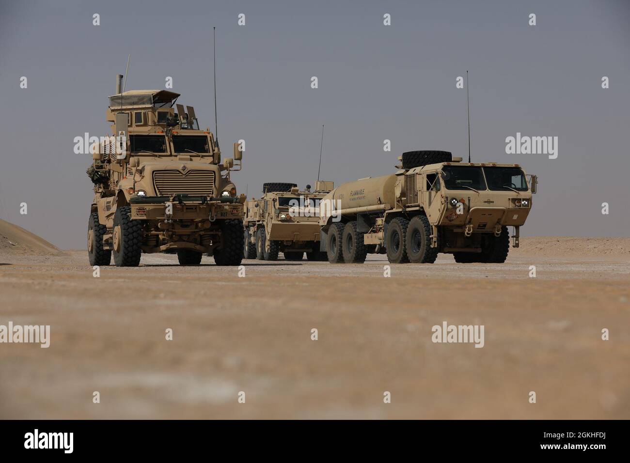 A U.S. Army M1224 Maxxpro MRAP providing security during Task Force Iron Valor’s validation exercise at Udairi Range Complex, Kuwait, April 22, 2021. The validation exercise field operation was the culminating event. The field operations included day and night training missions. Stock Photo