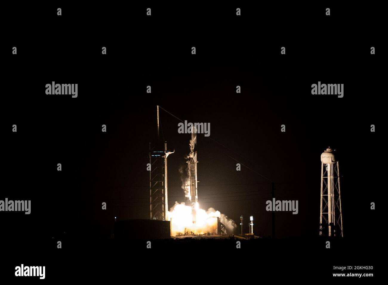 A SpaceX Falcon 9 rocket launches from Space Launch Complex 39A on April 23, 2021, at Kennedy Space Center, Florida. The rocket launched the four members of Dragon Crew-2 into space. The astronauts will spend six months on the International Space Station performing a variety of experiments and maintenance actions on the orbiting laboratory. Stock Photo