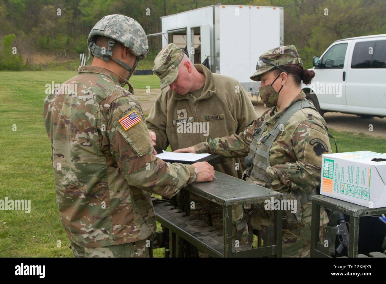 U.S. Army Reserve Soldiers with the 338th Army Band, prepare for range qualifications at Camp Sherman Joint Training Center, Chillcothe, Ohio, April 24, 2021. Proper weapon safety, conduct and handling are priorities for the U.S. Army. Stock Photo