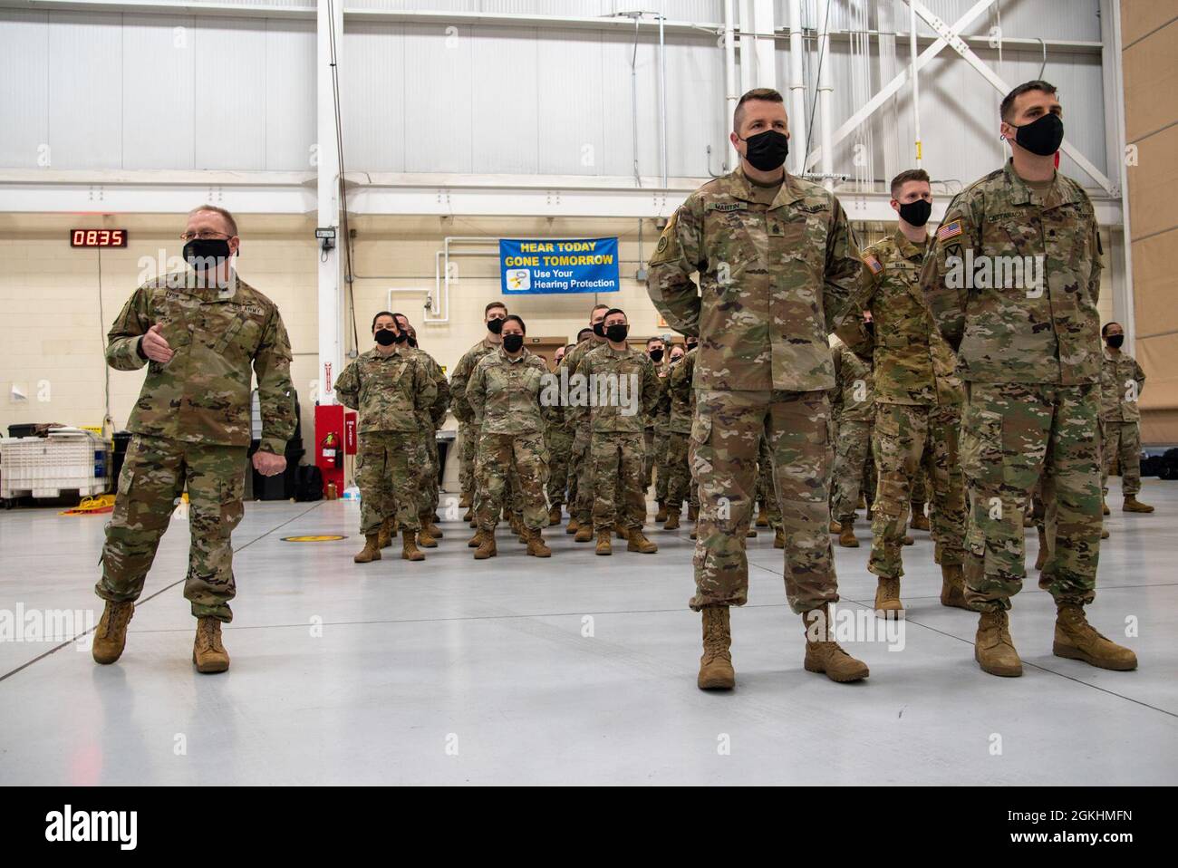 Major Gen. Francis Evon addresses family members of Soldiers assigned to HHC 1-169th Aviation Regiment at a sendoff event on April 25, 2021 in Windsor Locks, Conn. The unit departed Connecticut that day for deployment to Kosovo. Stock Photo