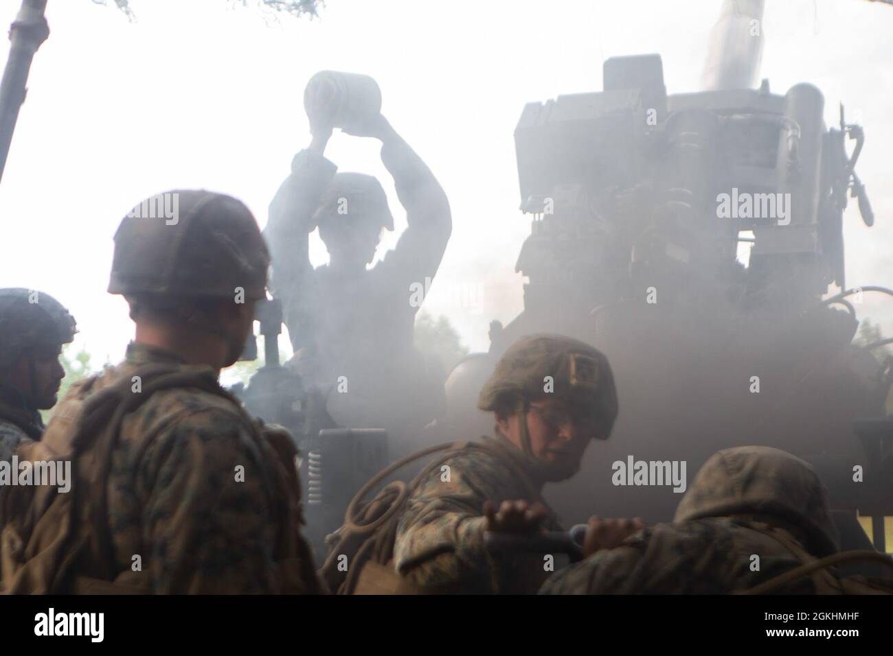 U.S. Marines with 1st Battalion, 10th Marine Regiment, 2d Marine Division (2d MARDIV), prepare to fire a M777 Howitzer during Exercise Rolling Thunder 21.2 on Fort Bragg, N.C, April 25, 2021. This exercise is a 10th Marine Regiment-led live-fire artillery event that tests 10th Marines' abilities to operate in a simulated littoral environment against a peer threat in a dynamic and multi-domain scenario. Stock Photo