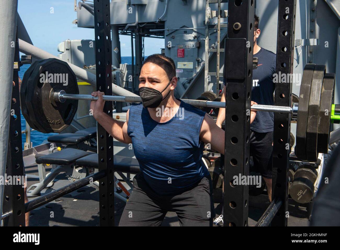 210425-N-RG587-1012 ATLANTIC OCEAN (April 25, 2021) Fire Controlman (Aeigis) 2nd Class Gilberto Ramirez, from Dallas, participates in a weight-lifting competition aboard the Ticonderoga-class guided-missile cruiser USS Vella Gulf (CG 72), April 25, 2021. Vella Gulf is operating in the Atlantic Ocean in support of naval operations to maintain maritime stability and security in order to ensure access, deter aggression and defend U.S., allied and partner interests. Stock Photo