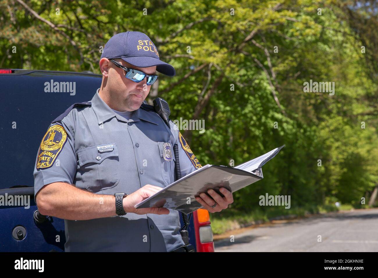 Officer Alan Wampler, Virginia State Police, teaches motorcycle safety for the Motorcycle Mentorship Program on Marine Corps Base Quantico, Virginia, April 26, 2021. The MMP holds monthly meetings to teach safety and go on rides. Stock Photo