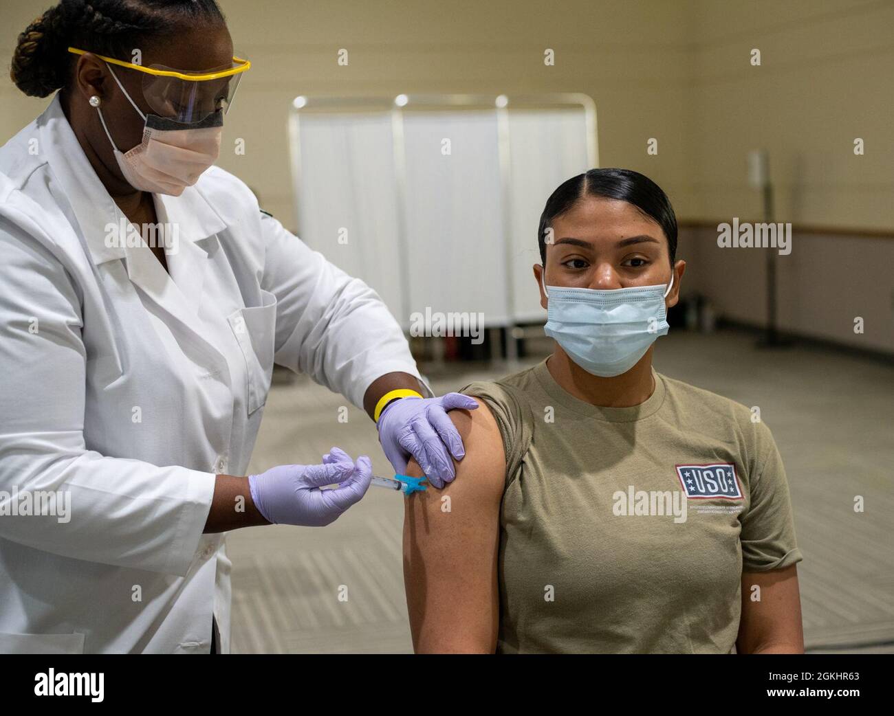 U.S. Army Cadet Brandi Brooks, assigned to the Bowie State University ROTC, receives the COVID