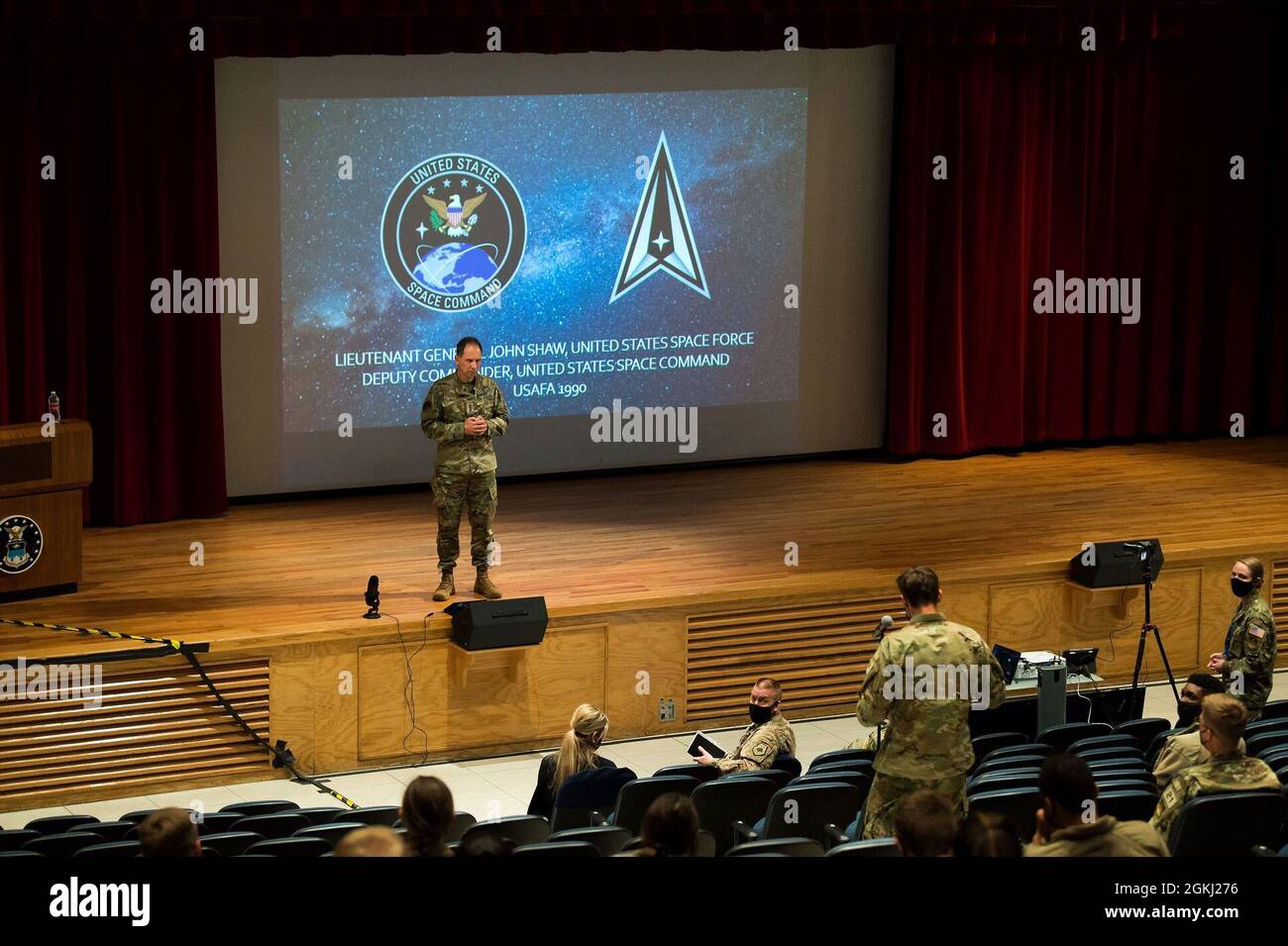 Lieutenant Gen. John Shaw, deputy commander of U.S. Space Command at Peterson Air Force Base, Colorado, speaks to cadets at the U.S. Air Force Academy April 28, 2021. Shaw visited the Academy to discuss the importance of the Academy’s mission of developing leaders of character as it relates to U.S. interests and capabilities in space. The general answered questions from the crowd of 100 cadets who will commission into the Force Next month about becoming the U.S.' newest Guardians. Stock Photo