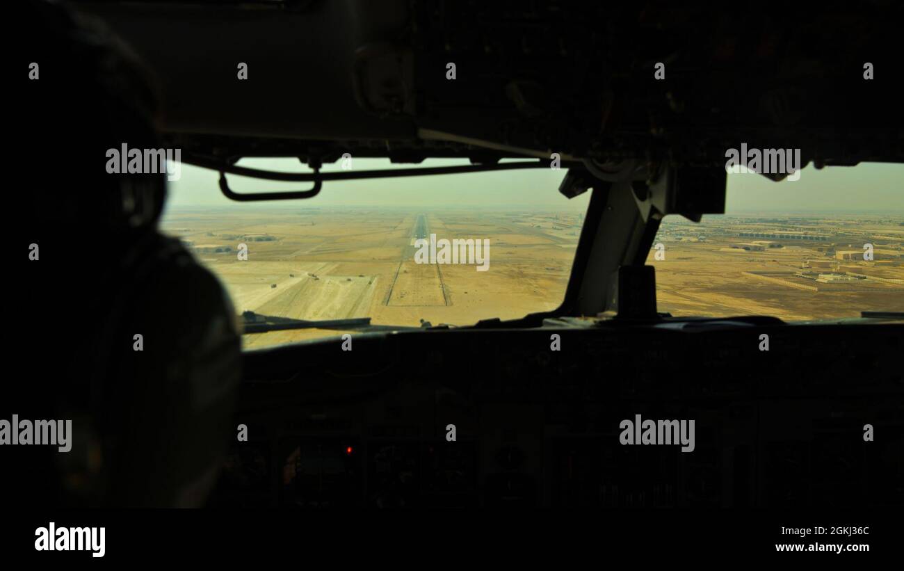 A U.S. Air Force pilot prepares to land an E-3 Sentry aircraft assigned to the 968th Expeditionary Airborne Air Control Squadron at Al Dhafra Air Base, United Arab Emirates, May 19, 2021. The E-3 crew, members of the 380th Air Expeditionary Wing, participated in Desert Mirage III – the third iteration of a bilateral event designed to enhance the interoperability and air defense capabilities between partner nation forces in the region. The AWACS delivered all-weather surveillance and direct information needed for interdiction, reconnaissance, airlift, and close-air support to joint and Royal Sa Stock Photo