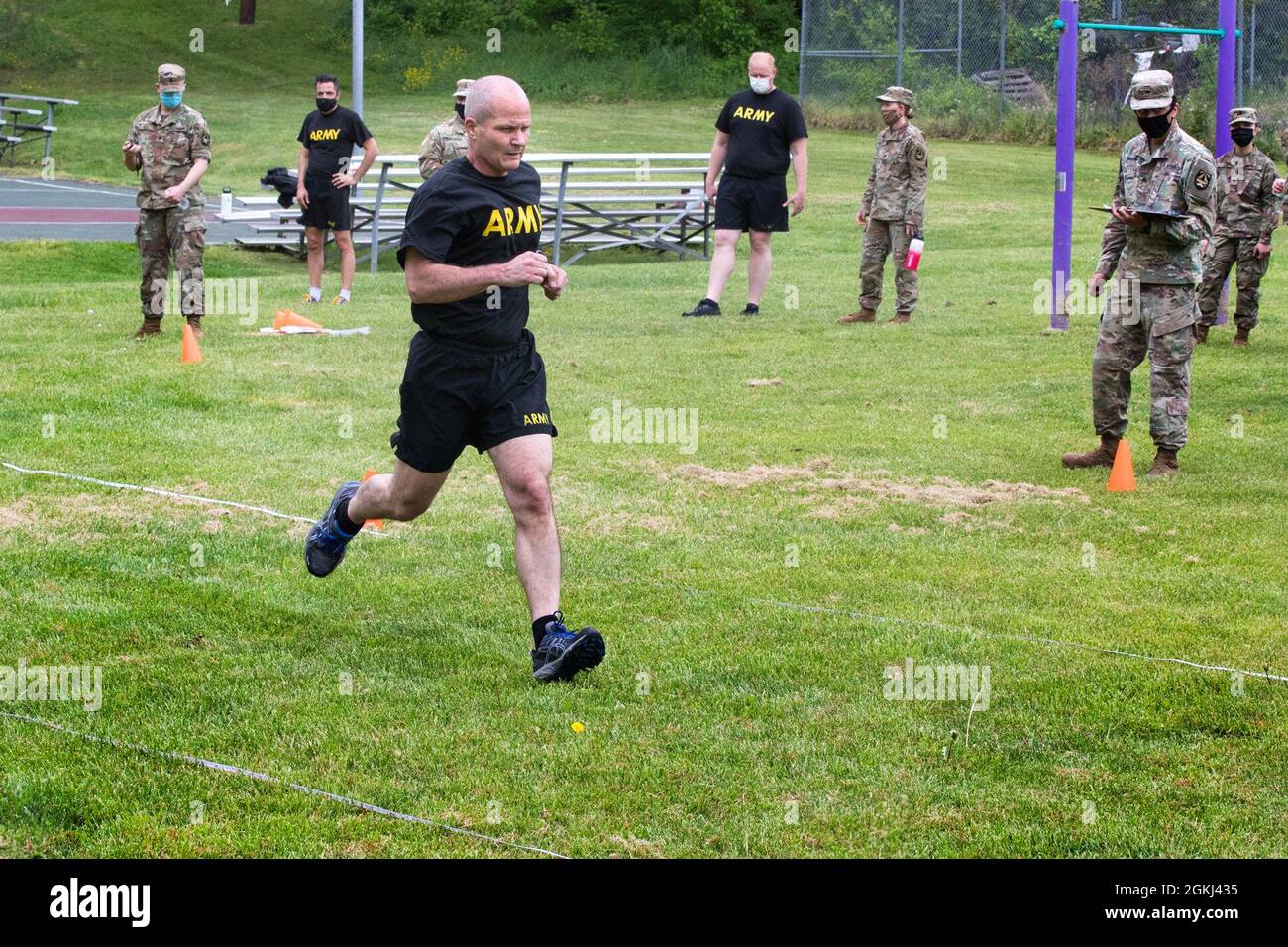 Col. Clint Murray, Commander of the Walter Reed Army Institute of Research, runs during the Sprint-Drag -Carry event as part of the new Army Combat Fitness Test (ACFT), April 29, 2021. The ACFT consists of six events: 3-Repetition Maximum Deadlift, Standing Power Throw, Hand-Release Push-Ups, Sprint-Drag-Carry, Leg Tuck or Plank, and 2-Mile Run. Stock Photo