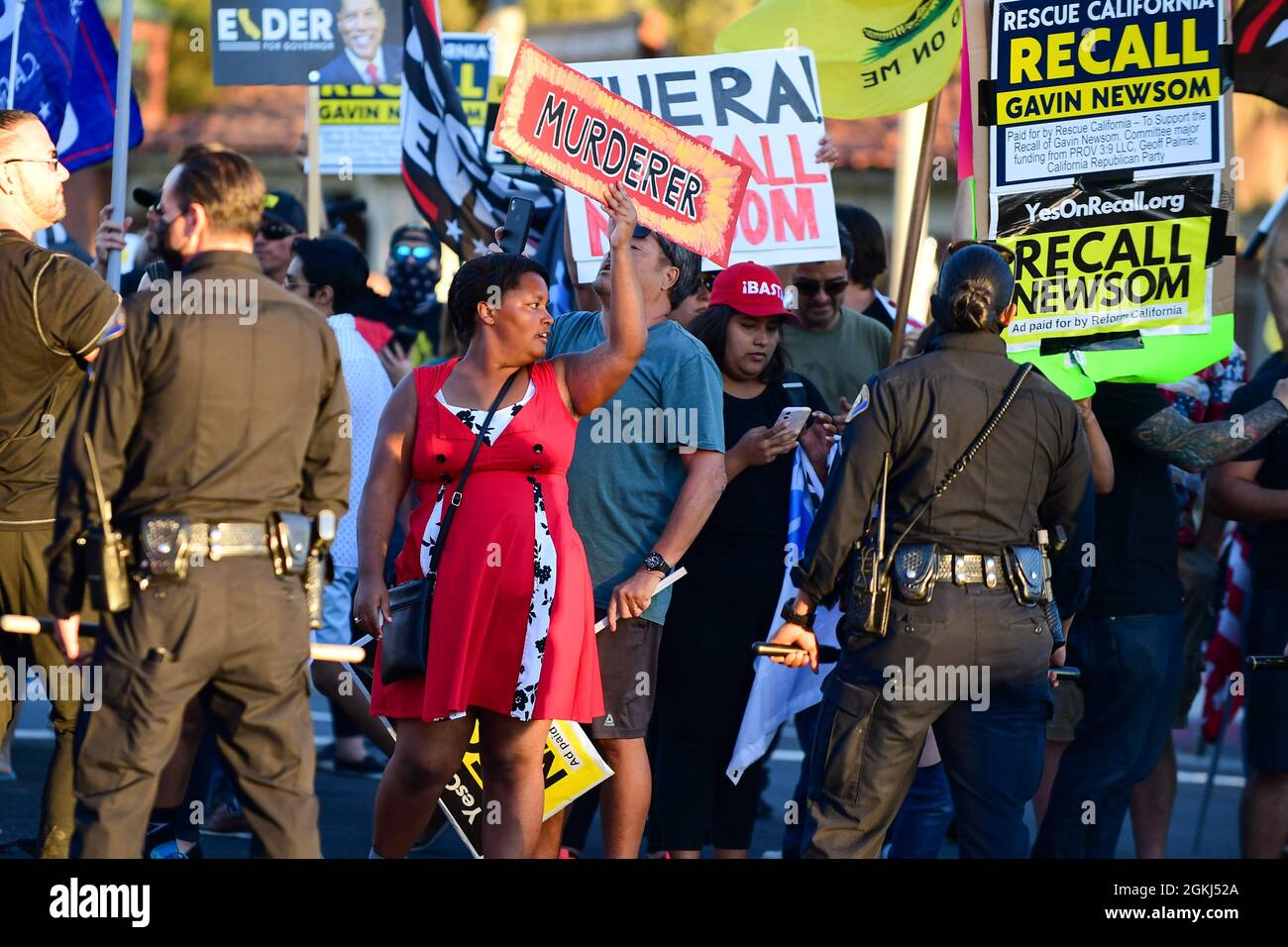 Demonstrators gather near Long Beach City College to protest a Vote No rally for Gavin Newsom, attended by President Joe Biden, Monday, Sept. 13, 2021 Stock Photo