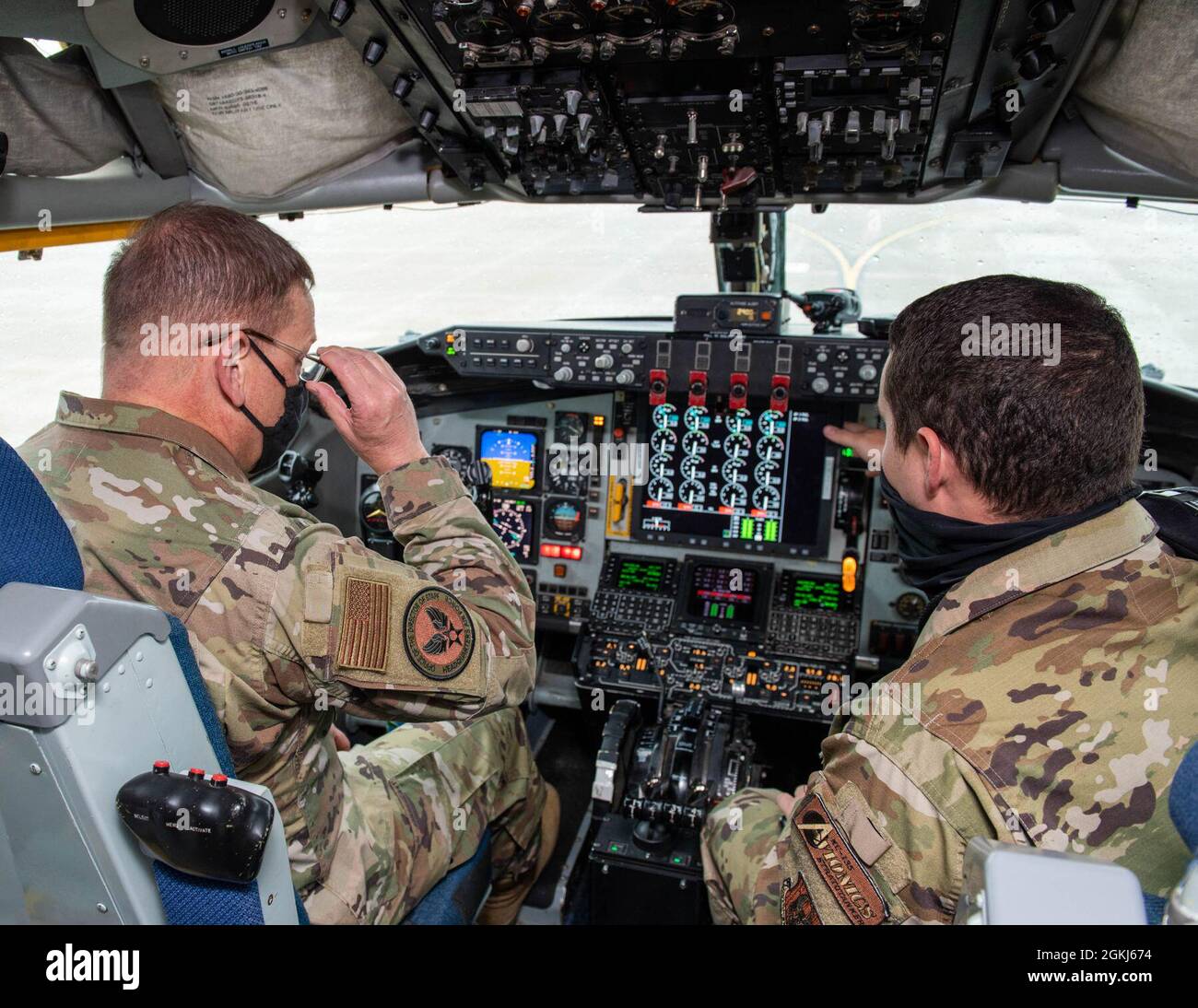 Gen. Max Stitzer, to the Chief of the Air Force Reserve and Military Deputy to the Directorate of Staff-Integration gets a briefing the avionics inside the flight-deck of