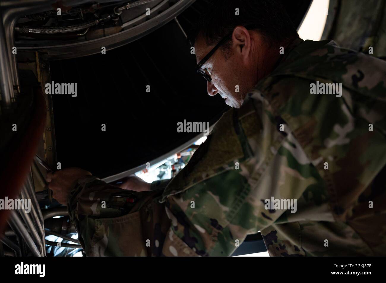Tech. Sgt. Timothy Brunette, 911th Aircraft Maintenance Squadron aerospace propulsion technican, conducts routine maintenance on a C-17 Globemaster III engine at the Pittsburgh International Airport Air Reserve Station, Pennsylvania, April 30, 2021. C-17 engines receive routine maintenance to ensure their mission and operational readiness. Stock Photo