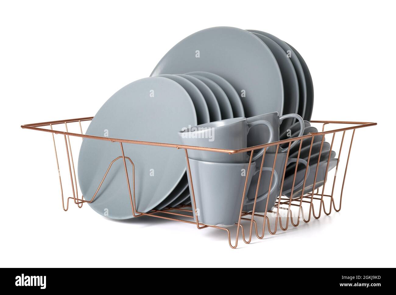 Set of clean dishes in drainer on white background Stock Photo Alamy