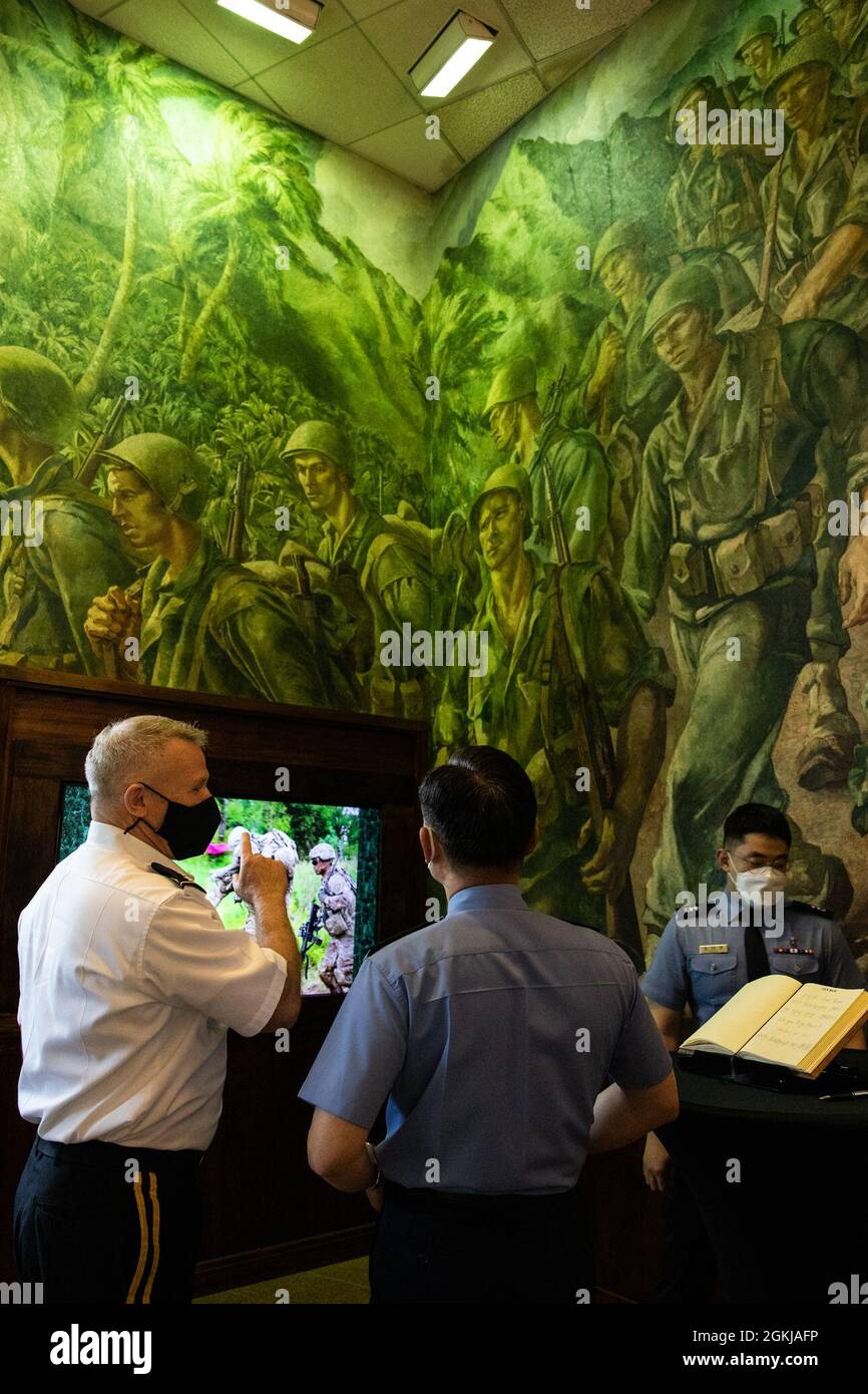 Gen. Paul J. LaCamera, U.S. Army Pacific commanding general, shows Gen. Won In-choul, Republic of Korea chairman of the joints chiefs of staff, the USARPAC mural at Richardson Hall during Won's visit to U.S. Army Pacific, April 30, 2021, at Fort Shafter, Hawaii. Won met with Gen. Paul J. LaCamera, U.S. Army Pacific commanding general, and his senior staff following the ceremony. The meeting created an opportunity for increased dialogue between senior military leaders. The strength of the U.S.-Republic of Korea alliance commitment remains ironclad. The United States and the ROK share a long his Stock Photo