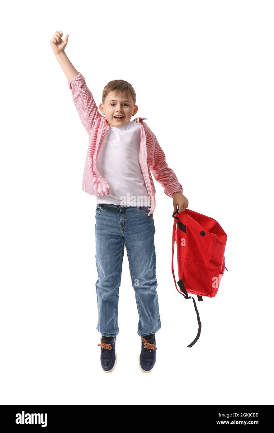 Jumping little schoolboy with backpack on white background Stock Photo ...
