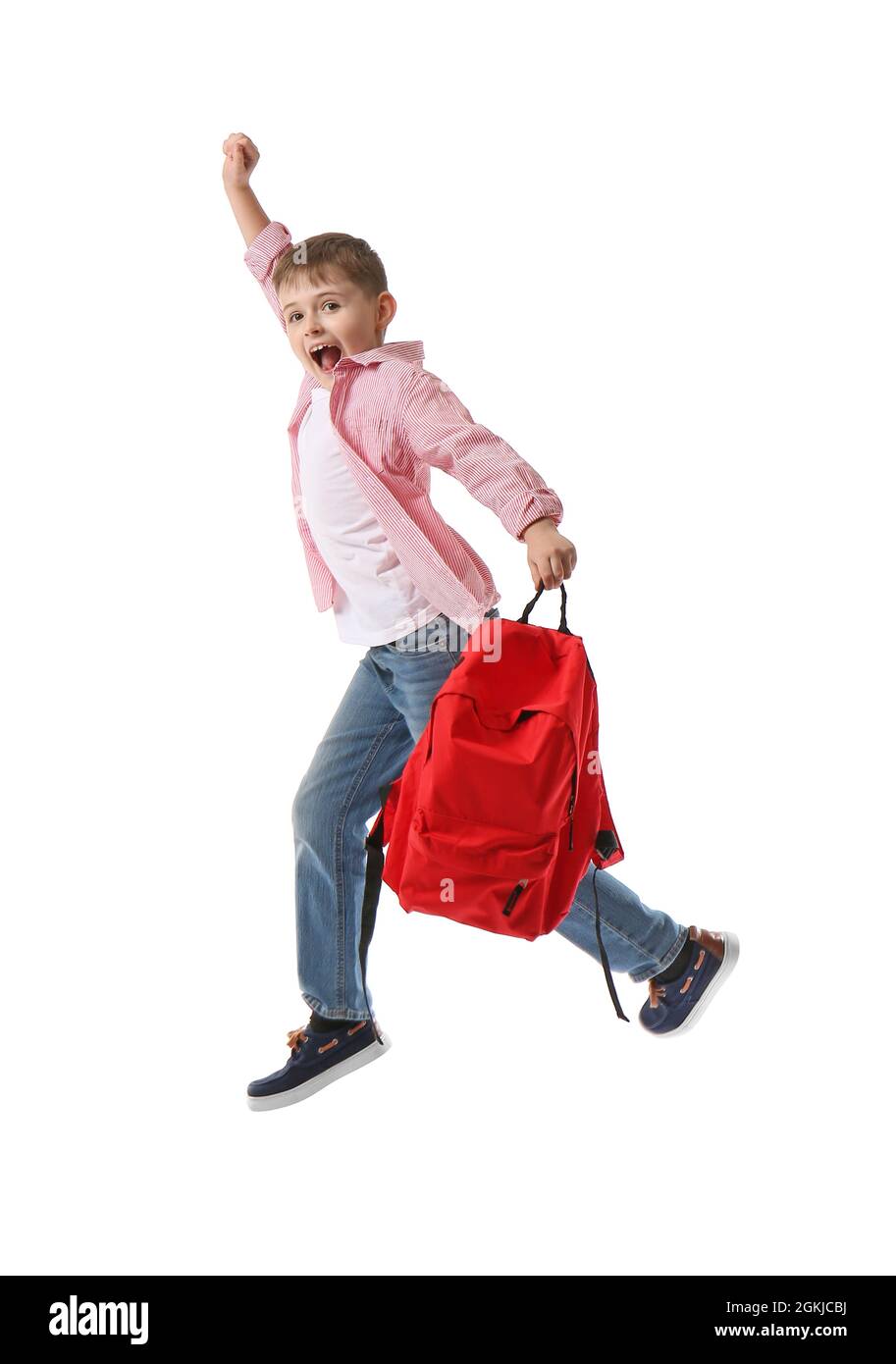 Jumping little schoolboy with backpack on white background Stock Photo ...