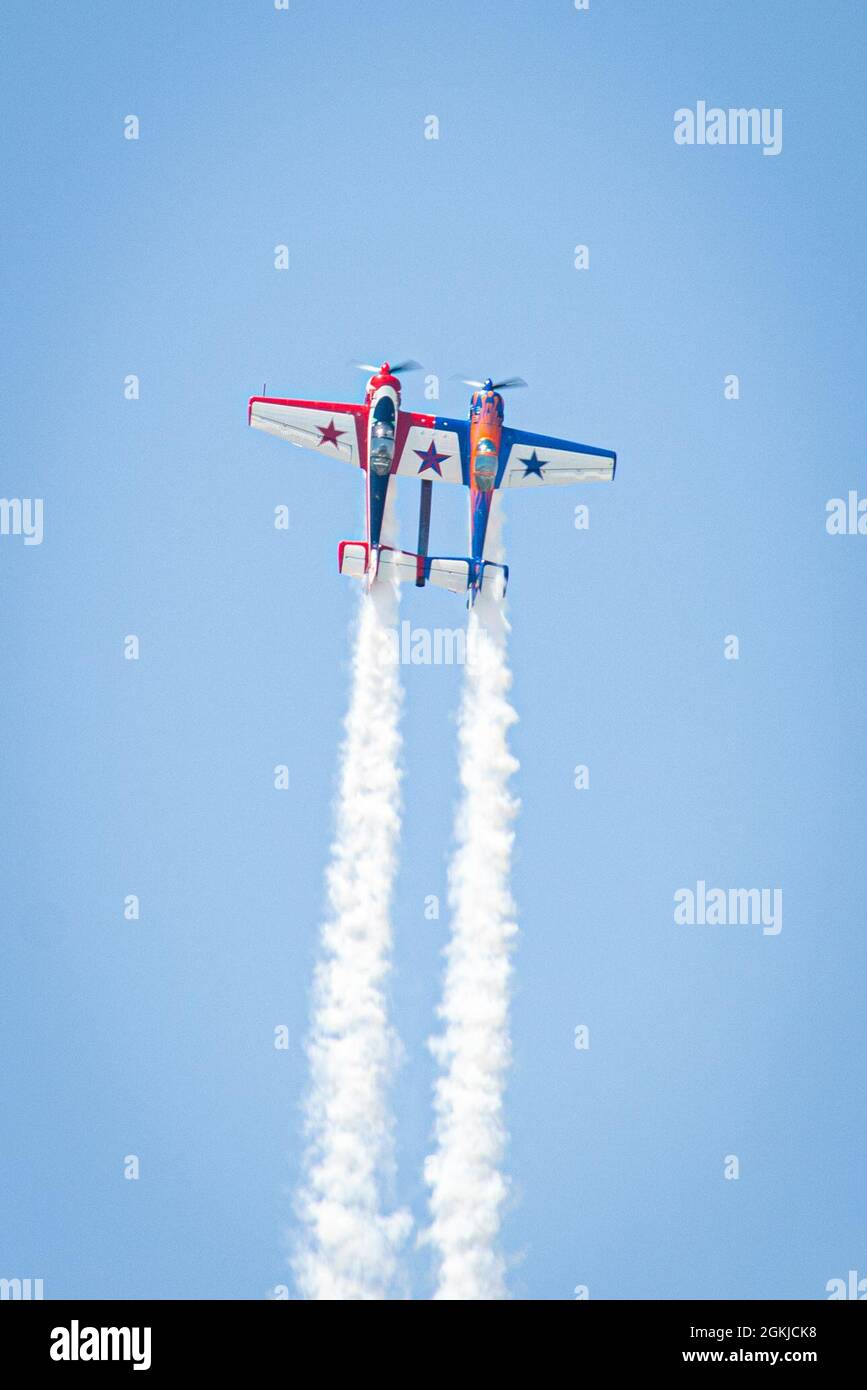 The YAK-110 aircraft piloted by Jeff Boerboon flies above an airstrip during the Speed of Sound Airshow at Rosecrans Memorial Airport in St. Joseph, Missouri, April 30, 2021. The Yak-110 is two Yak-55 aircraft connected together with a J-85 jet engine welded to the bottom. The air show was hosted by the 139th Airlift Wing, and city of St. Joseph to thank the community for their support. The air show committee estimated around 30,000 people attended during the weekend performances in which the United States Air Force Thunderbirds Air Demonstration Squadron were featured. Stock Photo