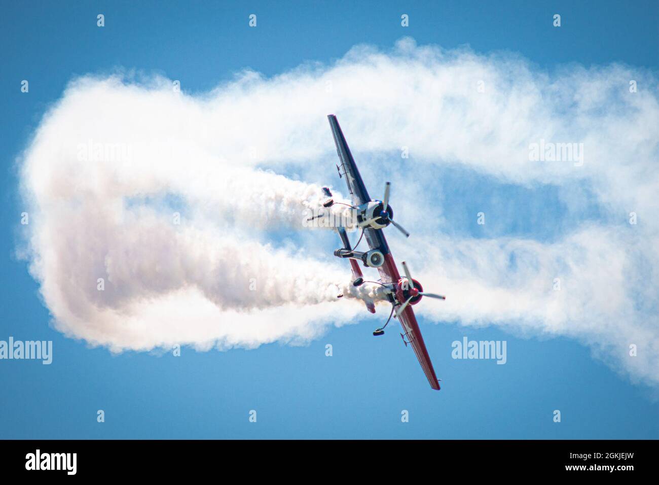 The YAK-110 aircraft piloted by Jeff Boerboon flies above an airstrip during the Speed of Sound Airshow at Rosecrans Memorial Airport in St. Joseph, Missouri, May 1, 2021. The Yak-110 is two Yak-55 aircraft connected together with a J-85 jet engine welded to the bottom. The air show was hosted by the 139th Airlift Wing, and city of St. Joseph to thank the community for their support. The air show committee estimated around 30,000 people attended during the weekend performances in which the United States Air Force Thunderbirds Air Demonstration Squadron were featured. Stock Photo