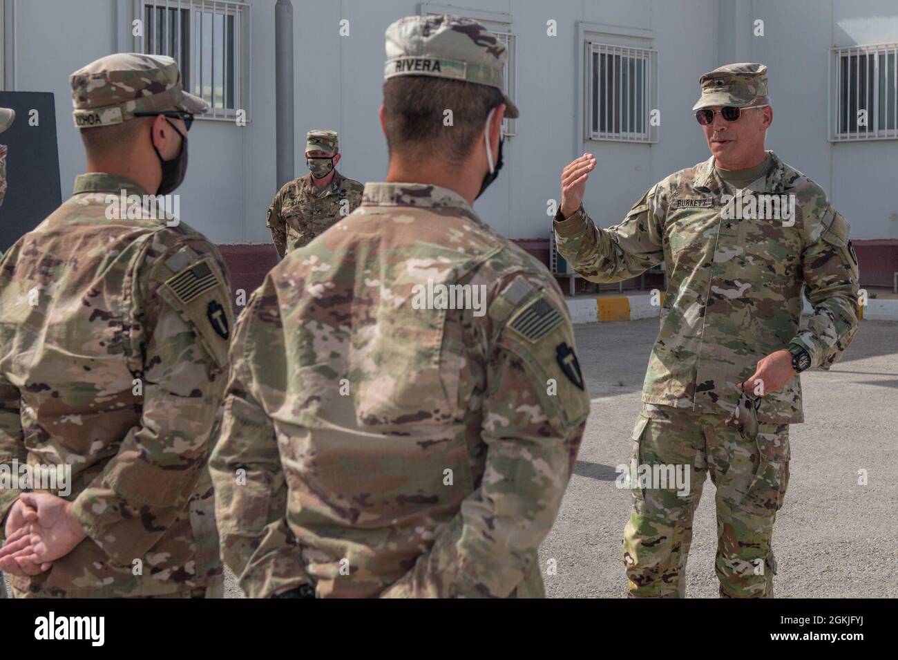 U.S. Army Soldiers from Task Force Spartan earn their right sleeve insignia during a ceremony hosted by the Division Tactical-Jordan Officer in Charge, Col. Christopher Fletcher and Sgt. Maj. Daniel Johnson for Division Tactical, at the Joint Training Center, May 3, 2021. Brig. Gen. Win Burkett, Task Force Spartan Assistant Commanding General- Operations spoke a few words commemorating their special day. Stock Photo