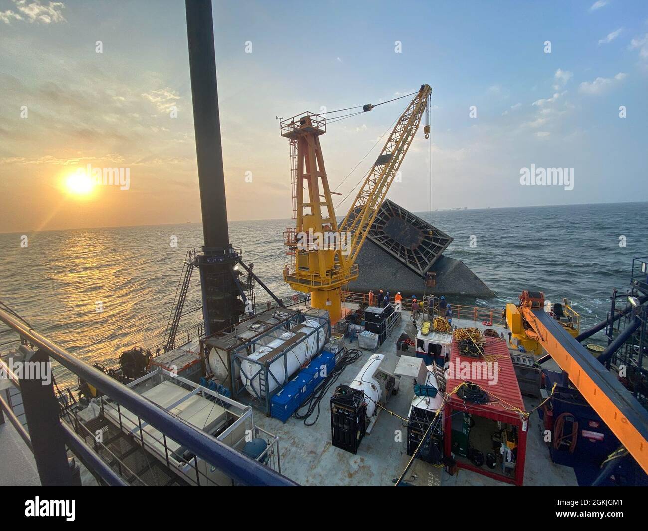 The SEACOR Eagle is staged with gear near the SEACOR Power May 3, 2021 off Port Fourchon, Louisiana. The vessel is being used as stable platform to assist in salvage and pollution prevention operations. Stock Photo