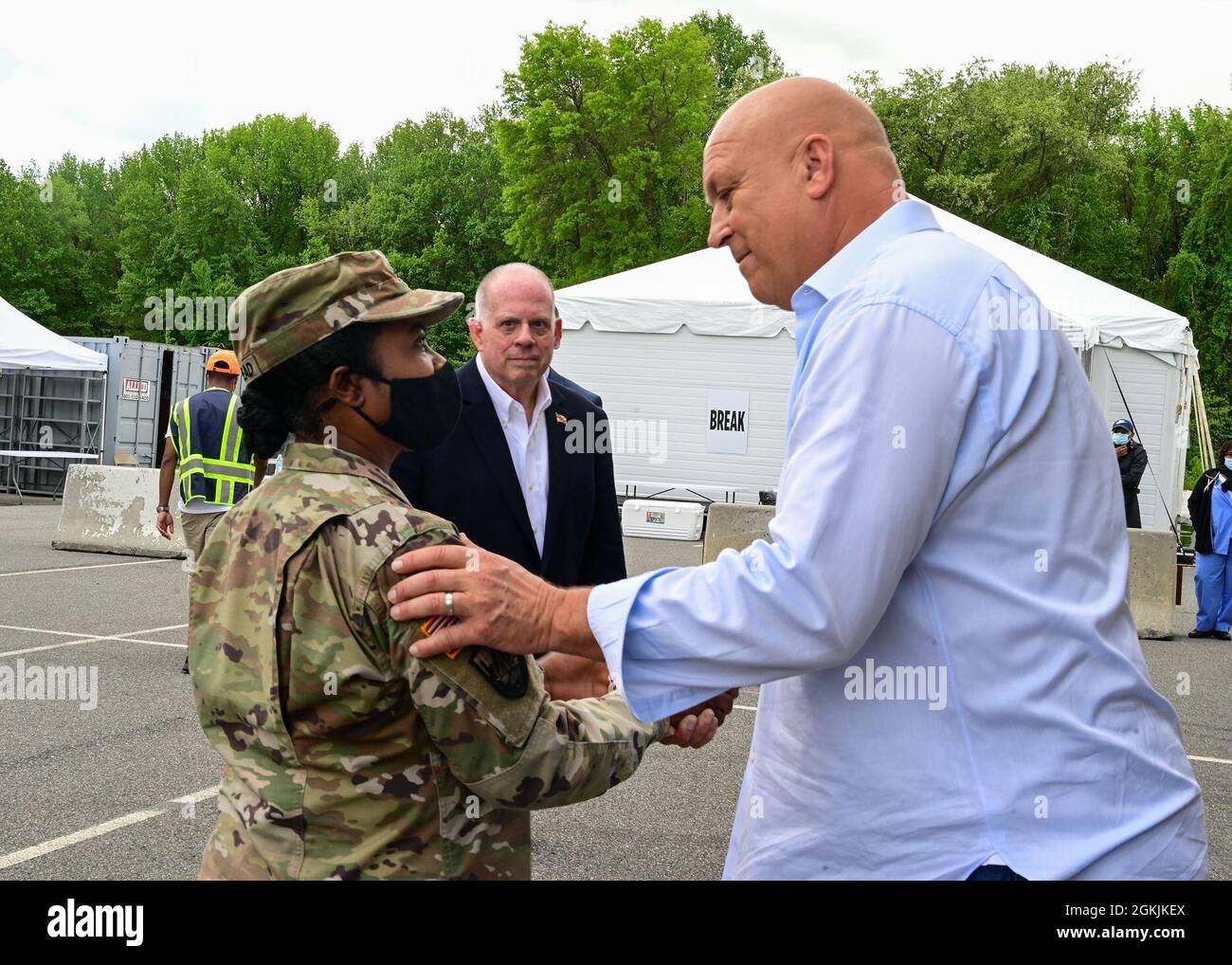 U.S. Army Brig. Gen. Janeen Birckhead, commander of the Maryland Army National Guard is greeted by Cal Ripken Jr. during a visit to the Ripken Stadium vaccination site on May 5, 2021, in Aberdeen, Maryland. Birckhead leads the Vaccine Equity Task Force, an initiative to promote equitable access to the COVID-19 vaccine throughout Maryland. Stock Photo