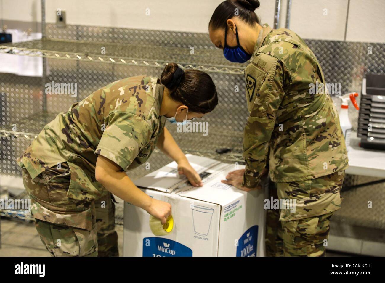 Spc. Lauren Damiano (left) and Spc. Savanna Stutts with Joint Task