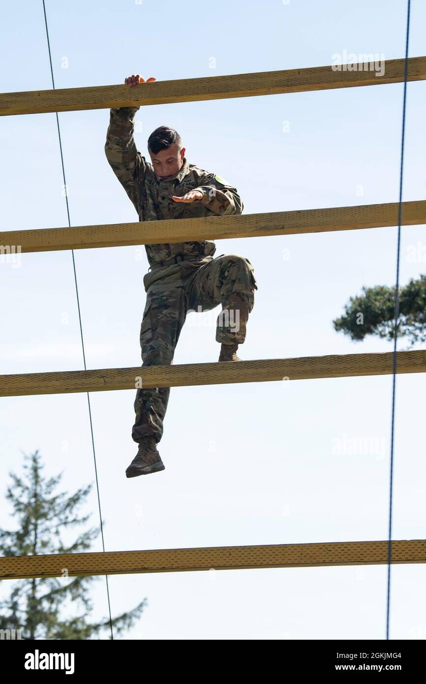 Wyoming Army National Guard Spc. Aiden Carroll climbs the tall tower ...