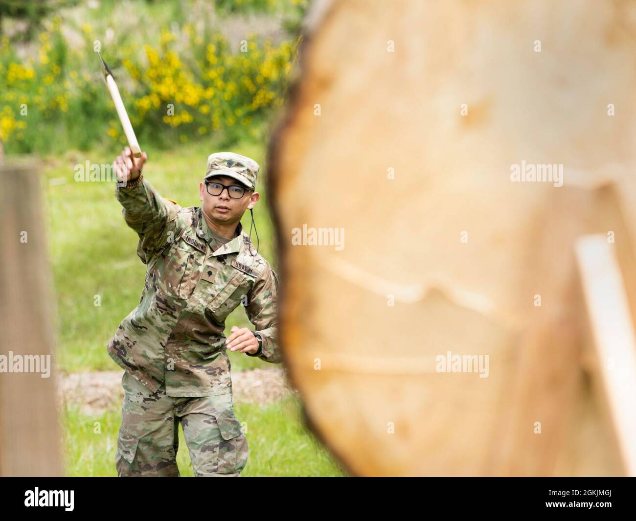 Alaska Army National Guard Spc. Jysamon Saouvongosses throws a hatchet at a target during the 2021 Region Six Best Warrior Competition at Camp Rilea, near Warrenton, Ore., on May 5, 2021. Soldiers are competing in nearly 20 events that were part of the 2021 Region VI Best Warrior Competition hosted by the Oregon National Guard. The competition included Soldiers from Alaska, Idaho, Montana, North Dakota, Oregon, South Dakota, Washington and Wyoming. Stock Photo