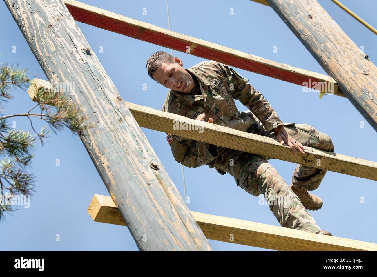 Wyoming Army National Guard Staff Sgt. Joshua Barry climbs a high tower ...