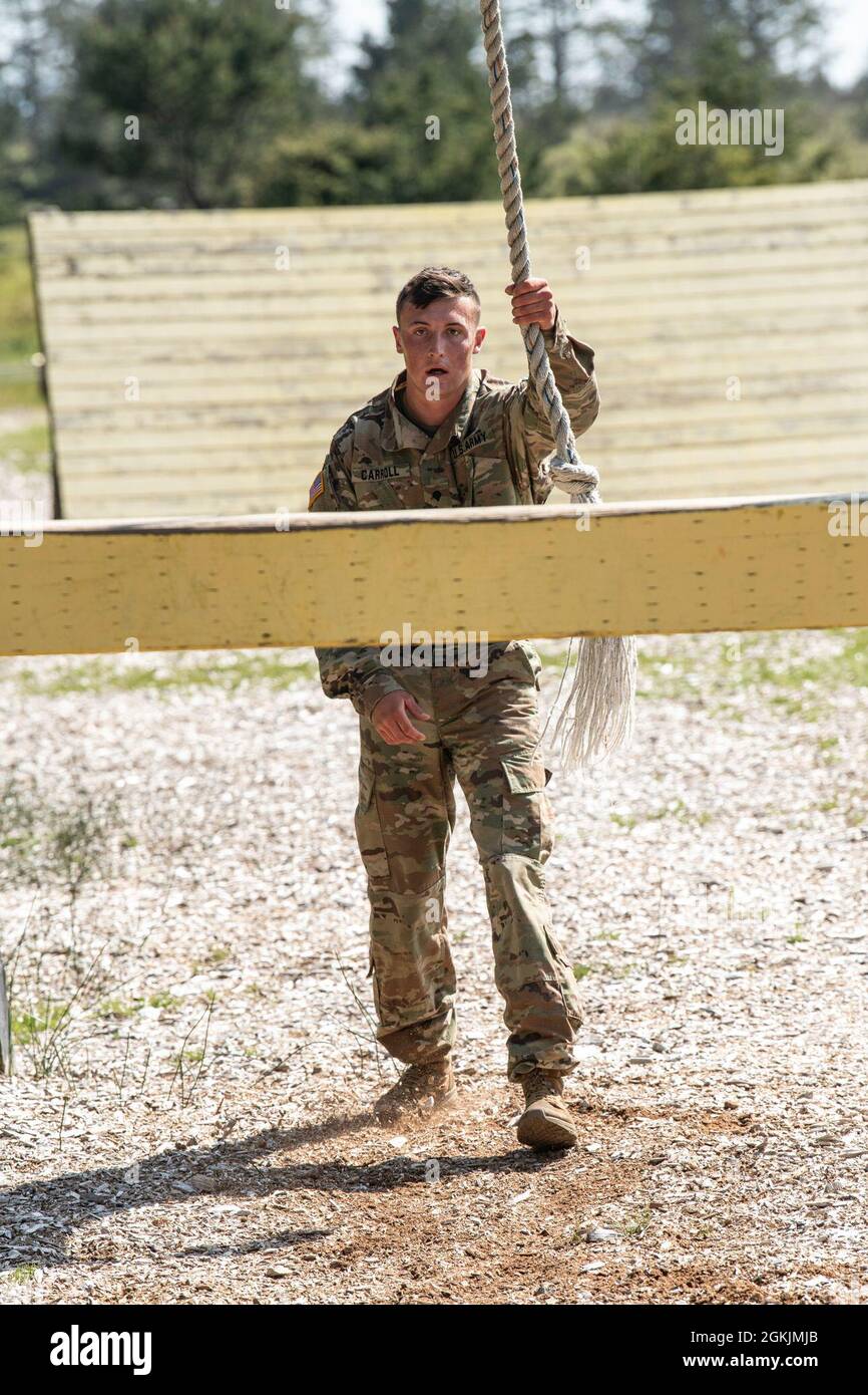 Wyoming Army National Guard Spc. Aiden Carroll prepares to use a rope ...