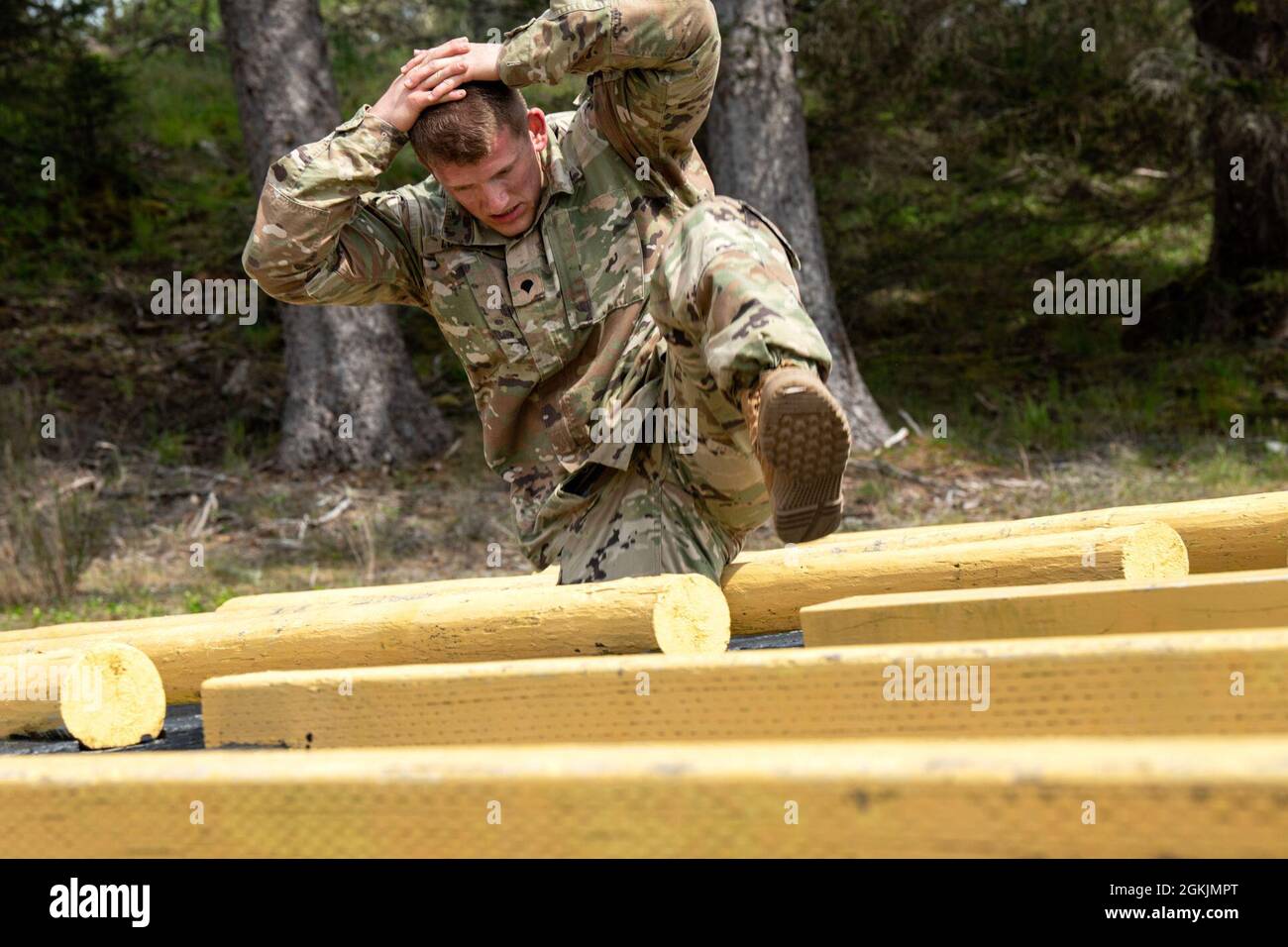 Montana Army National Guard Staff Spc. Jeffrey Lohman moves through the ...