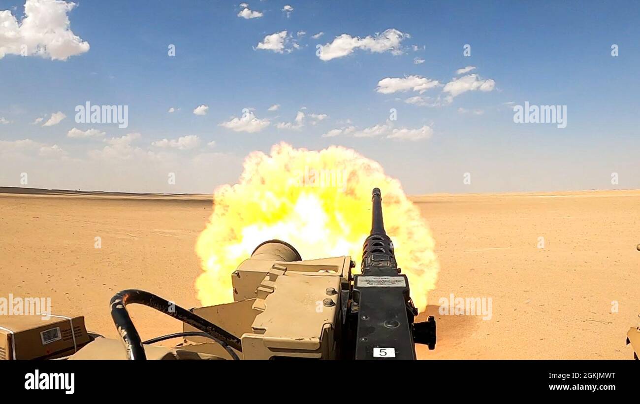 The 1st Battalion, 194th Armor Regiment, 1st Brigade Combat Team, 34th Infantry Division, test fires their M1 Abrams Main Battle Tanks, May 3, 2021, at Udairi Range Complex, Kuwait. The main gun of the M1 Abrams MBT shoots a 105 mm round, which was being prepared and calibrated to support Operation Phantom Steadfast. The unit reports to Task Force Spartan while deployed in Southwest Asia. Stock Photo