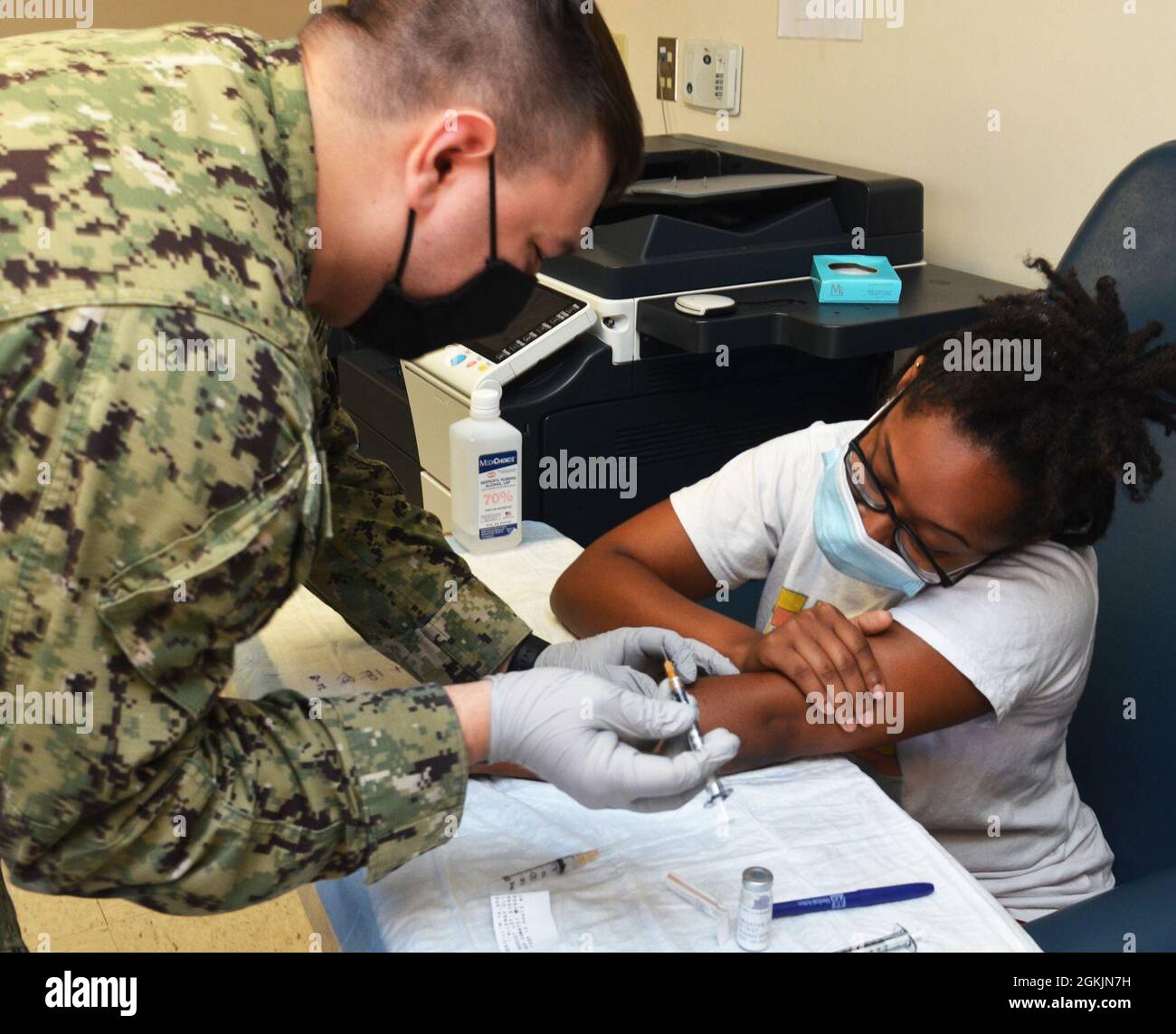 JACKSONVILLE, Fla. (May 5, 2021) - Hospital Corpsman 3rd Class Brian Krawsczyn, of Naval Hospital Jacksonville’s Allergy Clinic, conducts allergy testing with a sailor.  Krawsczyn, a native of Jefferson, Ohio, says, “For medical readiness, it’s important for sailors to know of any allergic reactions.”  May is Asthma and Allergy Awareness Month. Estimates are that about 25 million Americans have asthma, 32 million have food allergies, and 24 million have hay fever. Stock Photo