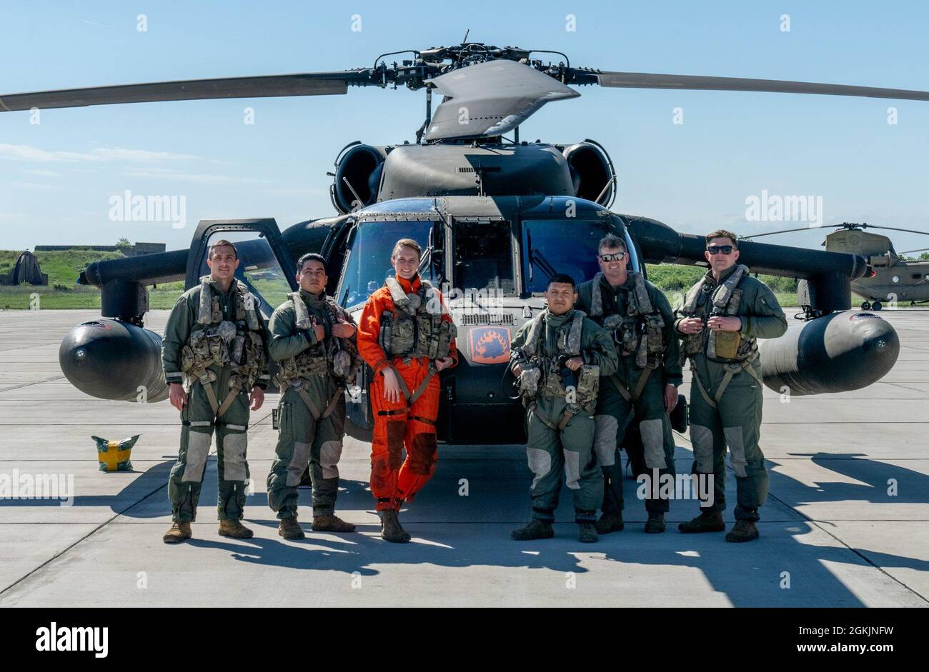 From right to left: U.S. Army Chief Warrant Officer 2 David Perales ...