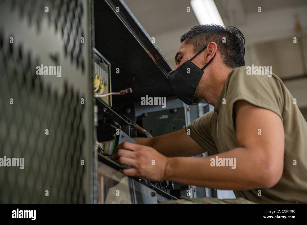 U.S. Air Force Staff Sgt. Brice Kiyota, an 18th Equipment Maintenance ...