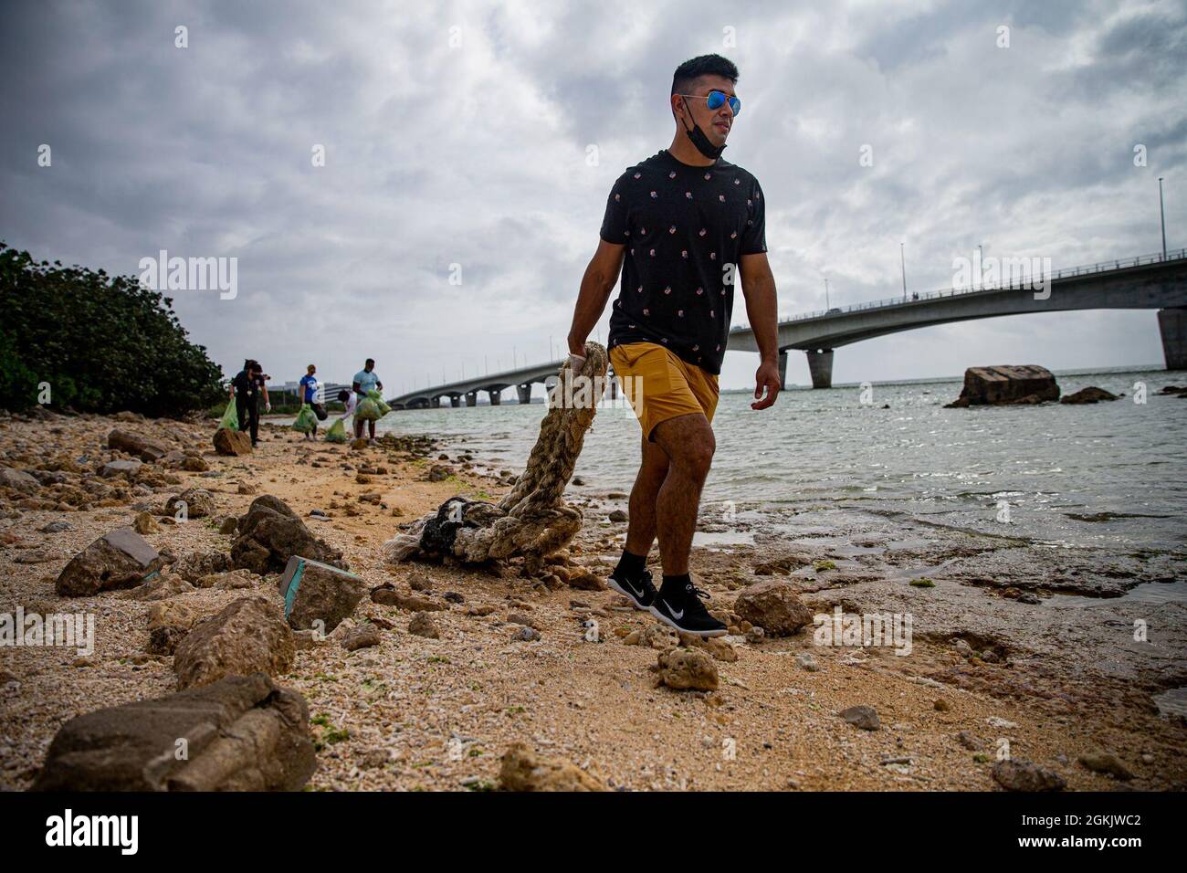 U S Marine Corps Cpl Eric Valdez An Automotive Maintenance Technician With 3d Maintenance Battalion 3d Marine Logistics Group Drags A Rope To Be Discarded Properly At The Earth Day Cleanup On Kaa Mii Jii