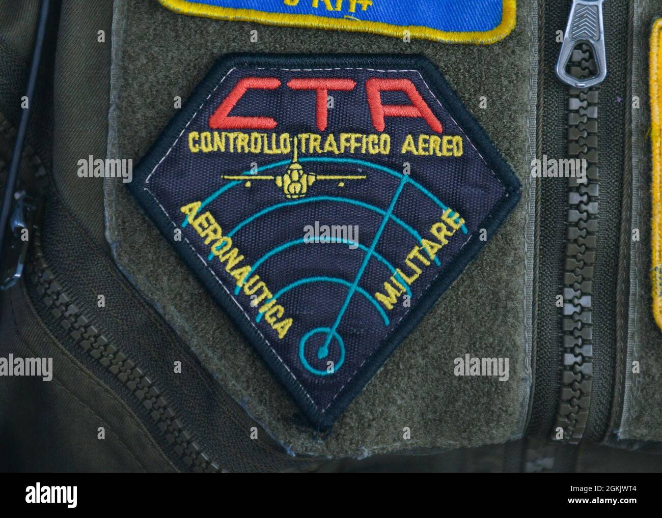 An Italian air force Servizio CSA, Air Traffic Control Service, air traffic controller (ATC), patch is shown at Aviano Air Base, Italy, May 7, 2021. The U.S. Air Force and ITAF ATCs work together to relay flight and landing instructions, weather updates, and safety information to pilots. The ATCs maneuver U.S. Air Force and ITAF F-16 Fighting Falcon and HH-60 Pave Hawk aircraft on the flight line and in the airspace 24-hours per day, seven days per week. Stock Photo