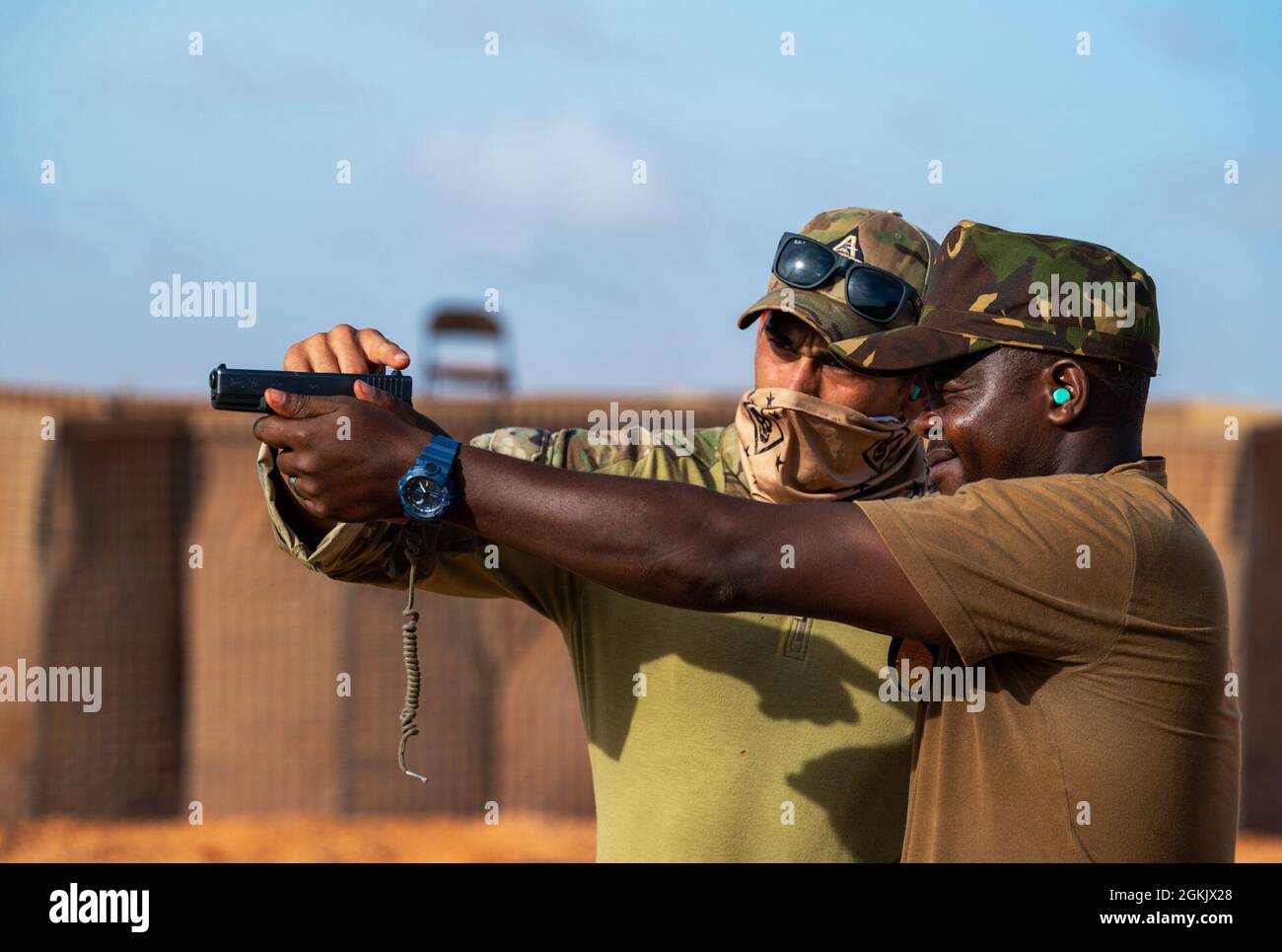 U.S. forces host a range day with the Kenya Defense Forces (KDF) in Somalia, May 7, 2021. Special Operations Command Africa remains engaged with partner forces in Somalia in order to promote safety and stability across the Horn of Africa. Stock Photo