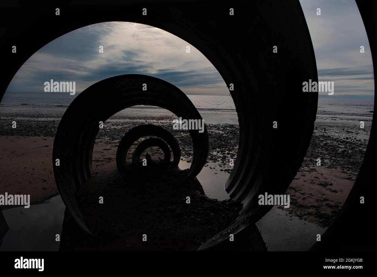 Mary's Shell Metal Sculpture at Cleveleys, showing the beach landscape