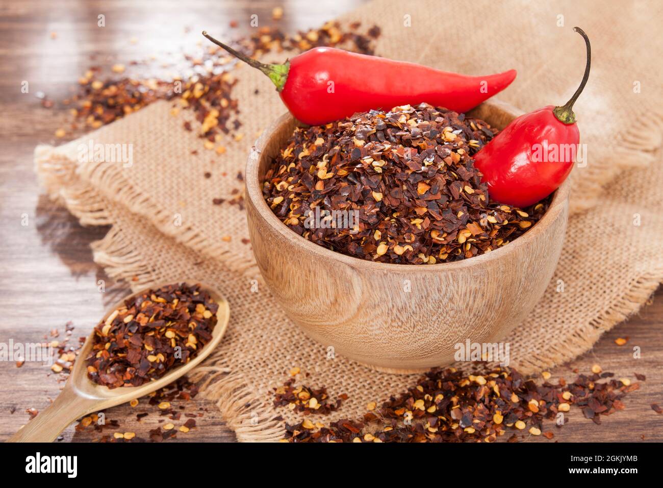 Crushed red cayenne pepper, dried chili and seeds Stock Photo Alamy